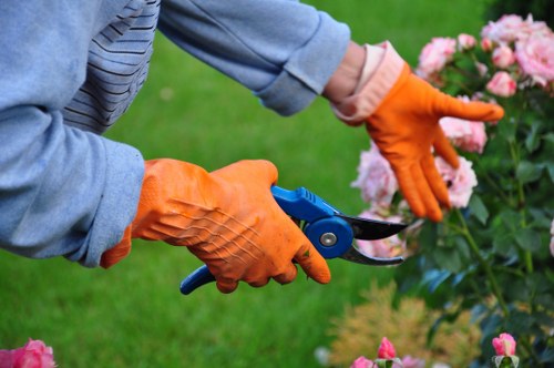 Safe handling of tools and materials during landscaping work